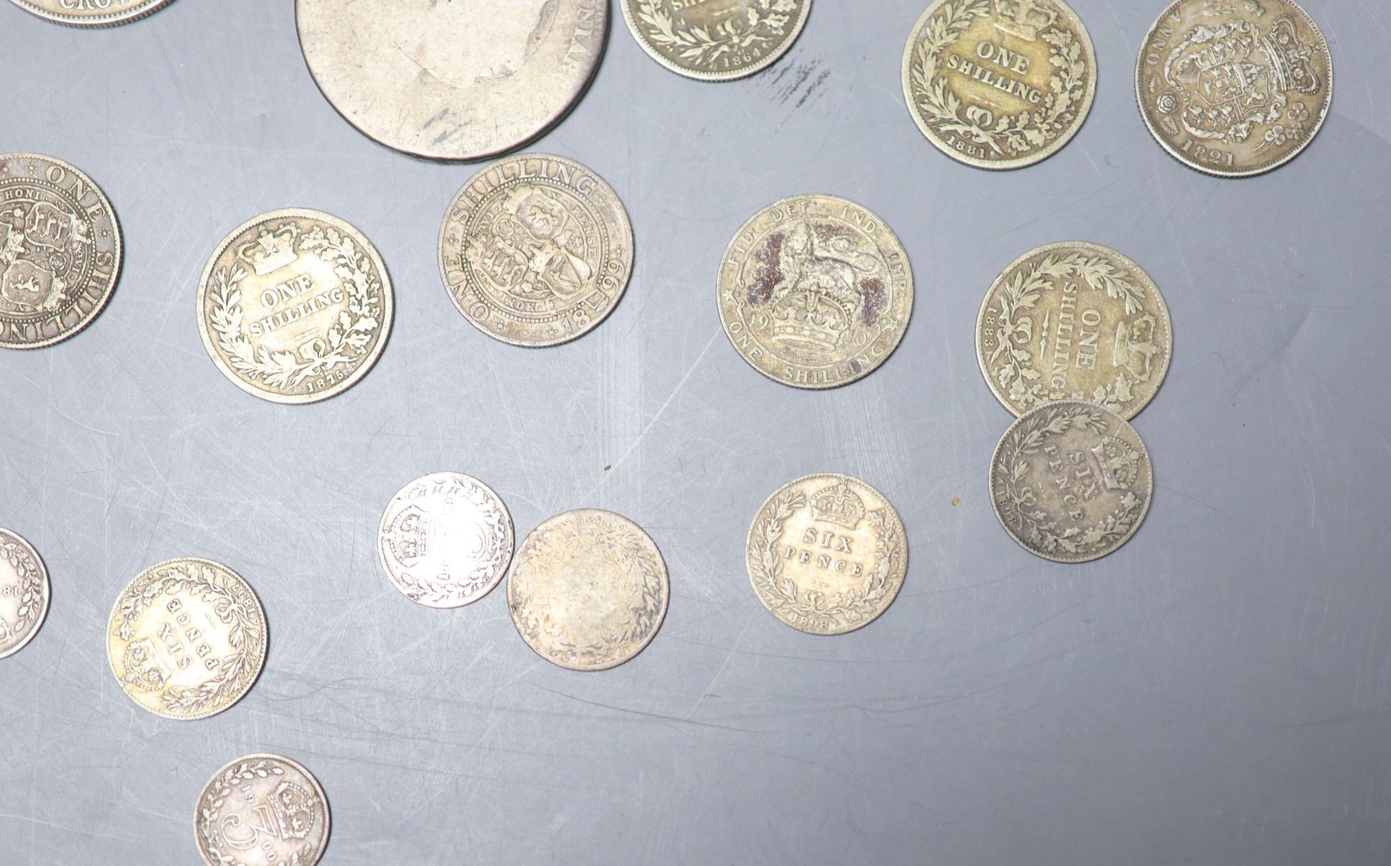 A collection of UK and world coins including George IV - George V silver threepences to halfcrowns